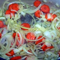 Cook carrot and onion.
