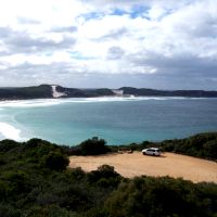 Looking down the beach from a hilltop lookout.